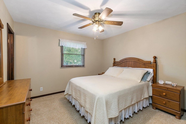 2206 Highland Dr, Sycamore, IL 60178 - bedroom featuring light carpet, ceiling fan, and baseboards