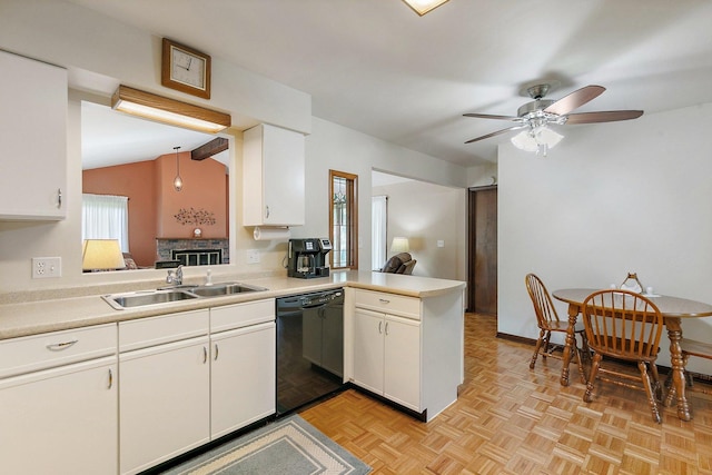 2206 Highland Dr, Sycamore, IL 60178 - kitchen with dishwasher, a sink, a peninsula, a ceiling fan, and light countertops