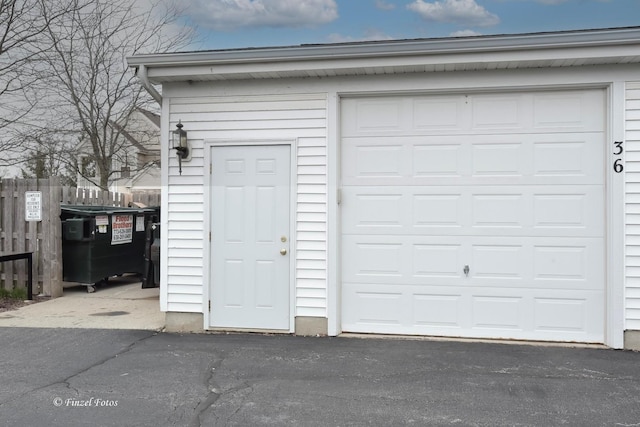 garage with fence