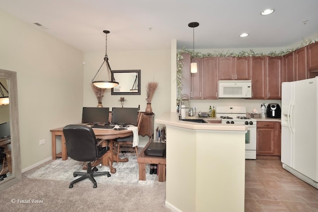 kitchen with visible vents, a peninsula, white appliances, recessed lighting, and a sink