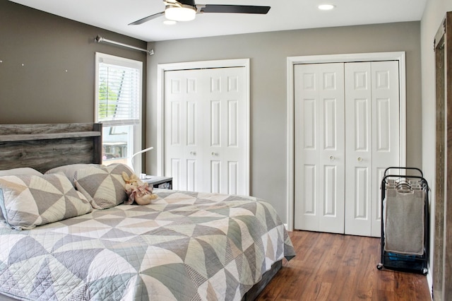 bedroom featuring recessed lighting, multiple closets, ceiling fan, and dark wood-style floors