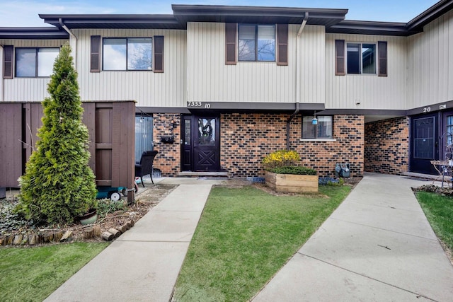 7333 Winthrop Way Unit 10, Downers Grove, IL 60516 - view of property featuring brick siding and a front lawn