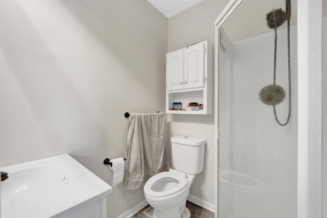 7333 Winthrop Way Unit 10, Downers Grove, IL 60516 - full bathroom with a stall shower, toilet, baseboards, and vanity
