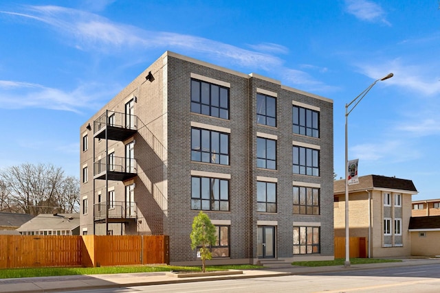8631 W Grand Ave Unit 4W, River Grove, IL 60171 - view of building exterior with fence