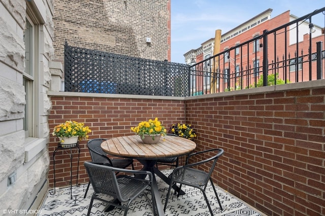 balcony with outdoor dining space