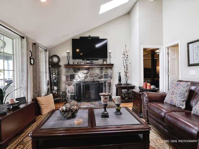 2601 N Villa Ln, Mchenry, IL 60051 - living area featuring a skylight, a fireplace, and high vaulted ceiling