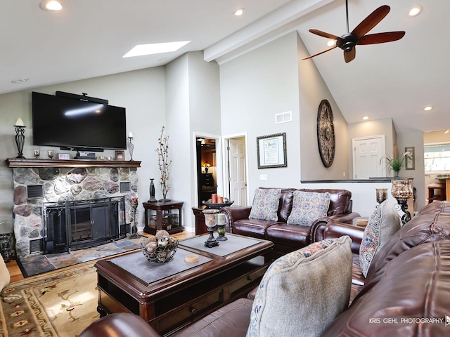 2601 N Villa Ln, Mchenry, IL 60051 - living area featuring ceiling fan, recessed lighting, high vaulted ceiling, a skylight, and a fireplace