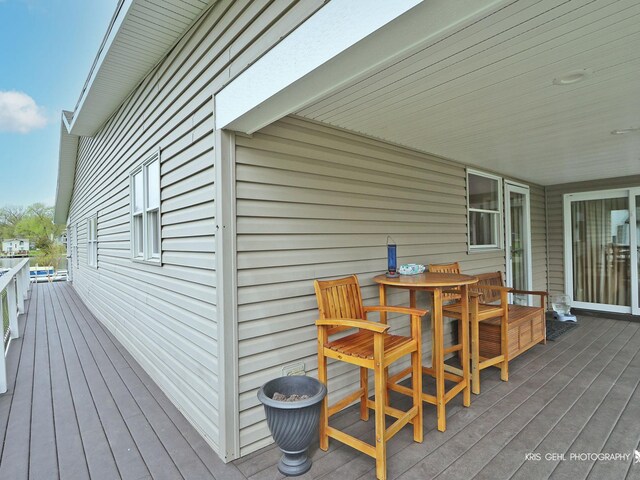 2601 N Villa Ln, Mchenry, IL 60051 - wooden terrace with outdoor dining area