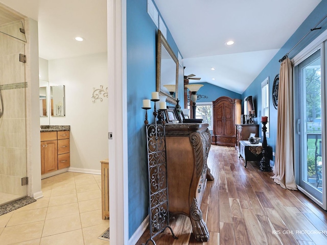 2601 N Villa Ln, Mchenry, IL 60051 - corridor with vaulted ceiling, recessed lighting, light wood-style floors, and baseboards