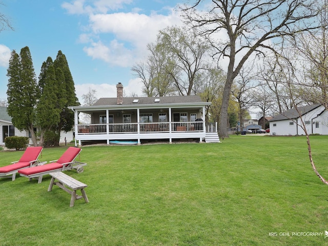 2601 N Villa Ln, Mchenry, IL 60051 - rear view of house with a yard and a chimney