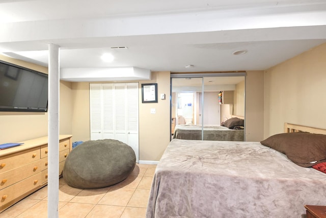 bedroom with recessed lighting, visible vents, and light tile patterned floors