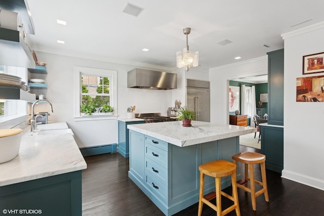 2334 Central Park Ave, Evanston, IL 60201 - kitchen featuring wall chimney range hood, a sink, stainless steel built in fridge, a baseboard heating unit, and ornamental molding