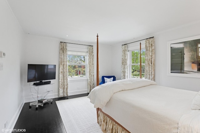 2334 Central Park Ave, Evanston, IL 60201 - bedroom featuring baseboards and wood finished floors