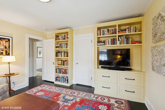 2334 Central Park Ave, Evanston, IL 60201 - living area featuring dark wood-style flooring, baseboards, and built in shelves