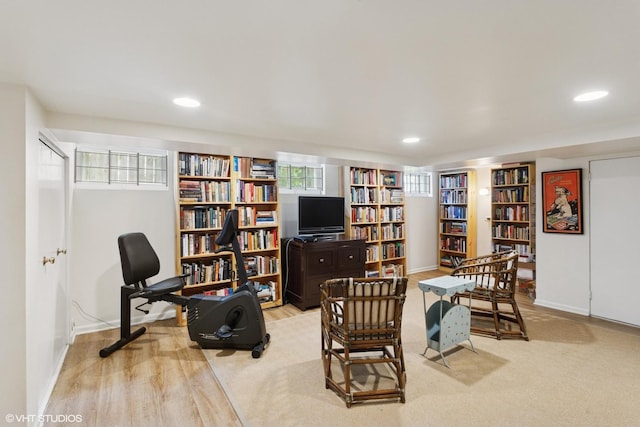2334 Central Park Ave, Evanston, IL 60201 - living area featuring baseboards, recessed lighting, built in shelves, and bookshelves