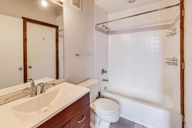 bathroom with vanity, bathtub / shower combination, toilet, and visible vents