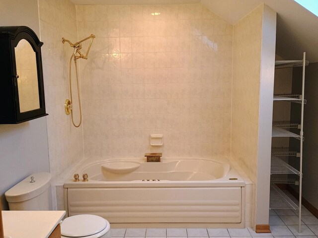 full bath featuring vanity, shower / bathing tub combination, tile patterned floors, and toilet