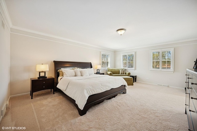 bedroom with crown molding, baseboards, and light carpet