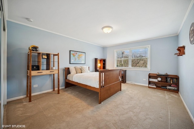 carpeted bedroom with baseboards and ornamental molding