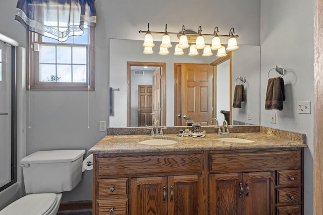 400 Rock Creek Dr, Manteno, IL 60950 - bathroom with a sink, toilet, double vanity, and visible vents