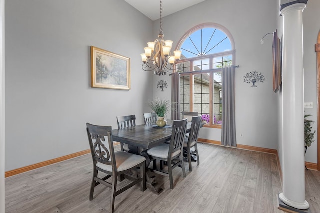400 Rock Creek Dr, Manteno, IL 60950 - dining area with baseboards, ornate columns, and light wood-style flooring