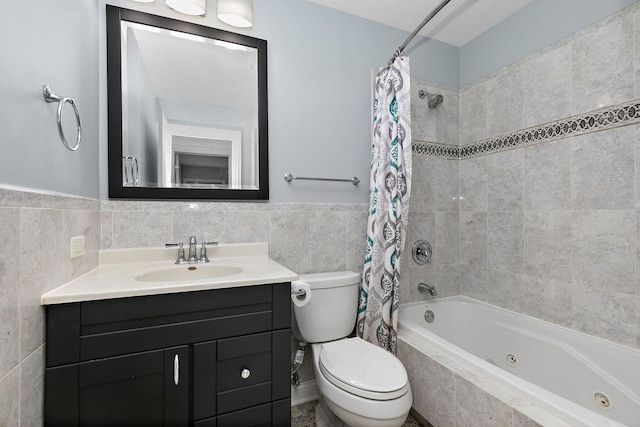 705 Old Mill Grove Rd, Lake Zurich, IL 60047 - full bath featuring vanity, toilet, tile walls, a combined bath / shower with jetted tub, and a wainscoted wall