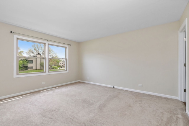 705 Old Mill Grove Rd, Lake Zurich, IL 60047 - unfurnished room featuring baseboards and light carpet