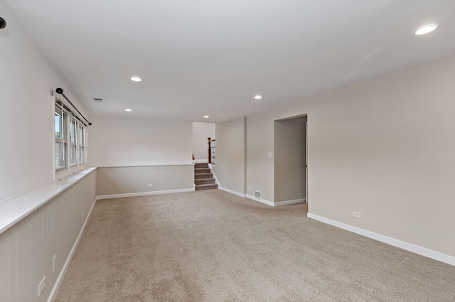 705 Old Mill Grove Rd, Lake Zurich, IL 60047 - unfurnished room featuring carpet flooring, recessed lighting, visible vents, and stairway