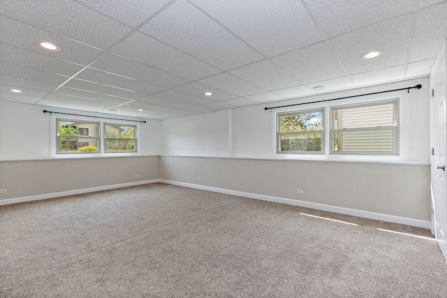 705 Old Mill Grove Rd, Lake Zurich, IL 60047 - empty room featuring carpet floors, a paneled ceiling, and a wealth of natural light