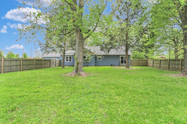 view of yard with a fenced backyard