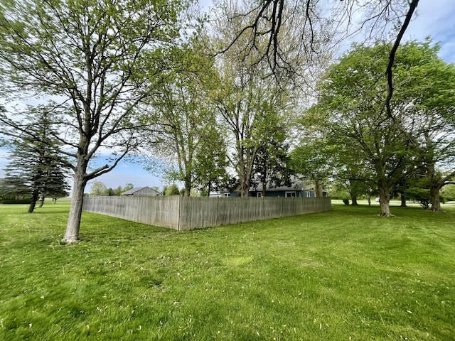 view of yard featuring fence