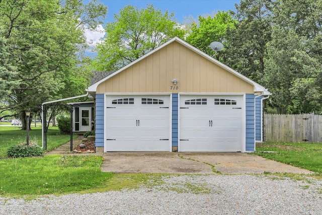 detached garage with fence