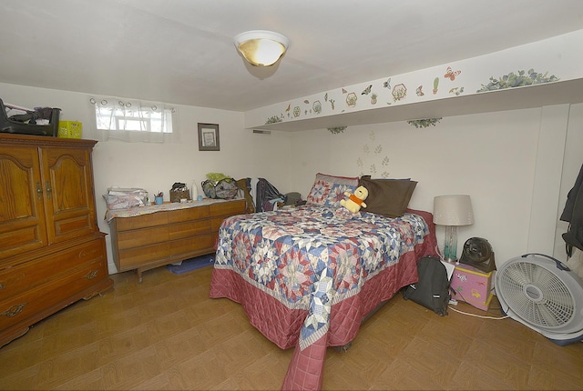 bedroom featuring light floors