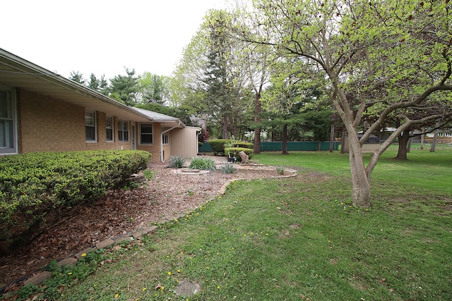 view of yard featuring fence
