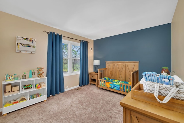 629 Sheffield Ln, Bolingbrook, IL 60440 - carpeted bedroom with a nursery area, baseboards, and visible vents