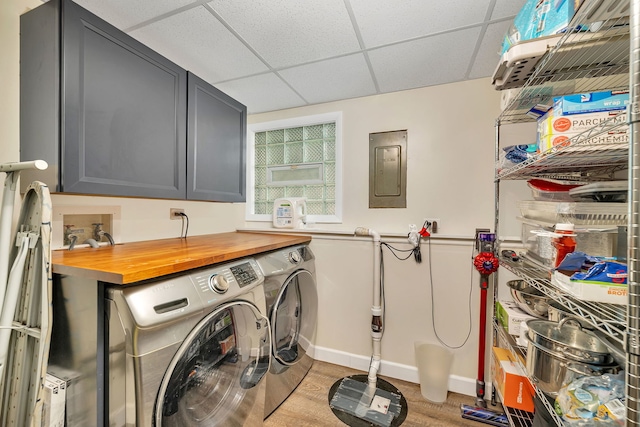 629 Sheffield Ln, Bolingbrook, IL 60440 - laundry room with cabinet space, baseboards, washing machine and clothes dryer, and electric panel