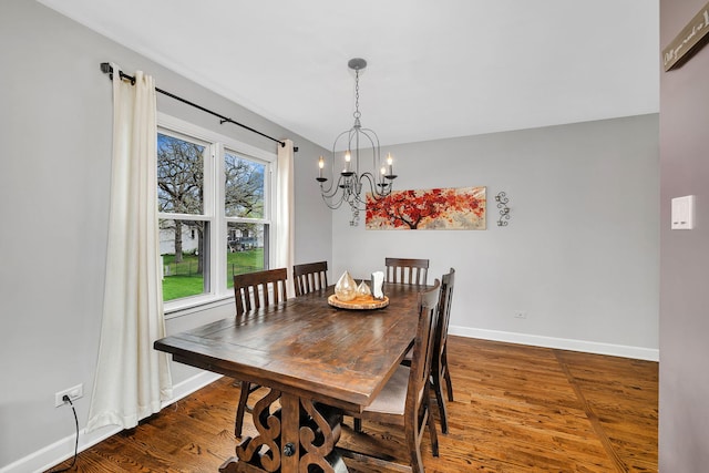 629 Sheffield Ln, Bolingbrook, IL 60440 - dining room with baseboards, wood finished floors, and a chandelier