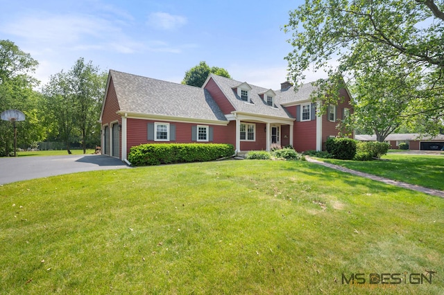 726 Parkside Dr, Sycamore, IL 60178 - view of front of home featuring driveway, a front yard, a shingled roof, and an attached garage