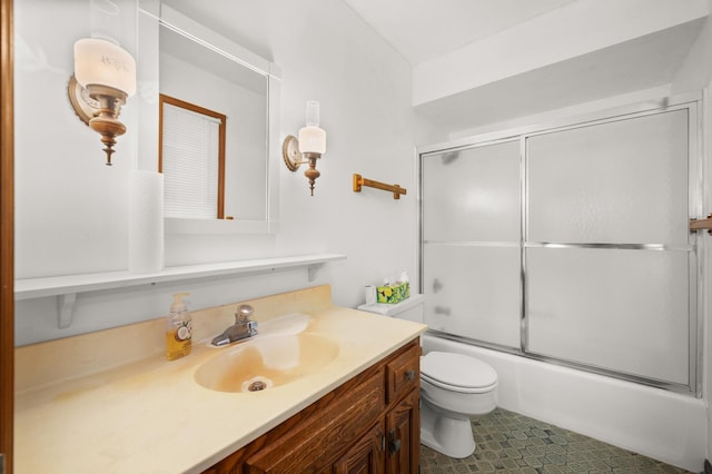 726 Parkside Dr, Sycamore, IL 60178 - full bathroom featuring toilet, vanity, enclosed tub / shower combo, and tile patterned flooring