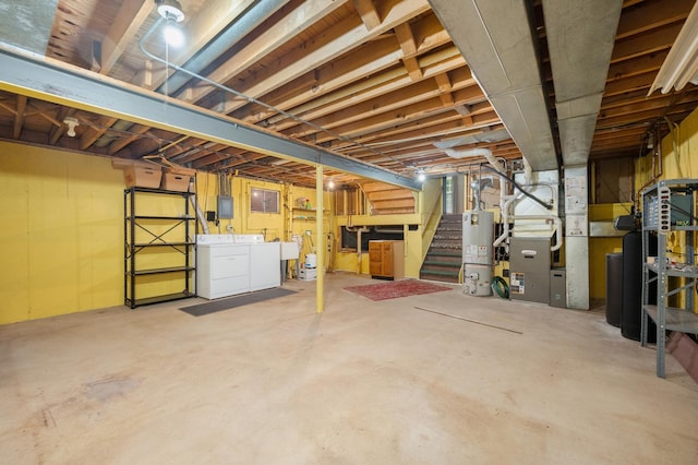 726 Parkside Dr, Sycamore, IL 60178 - unfinished basement featuring separate washer and dryer, stairs, gas water heater, heating unit, and a sink