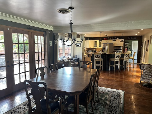 436 E Seminary Ave, Onarga, IL 60955 - dining area featuring a chandelier, dark wood-type flooring, french doors, and crown molding