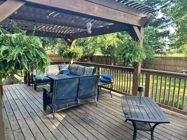 436 E Seminary Ave, Onarga, IL 60955 - wooden terrace featuring a fenced backyard, a pergola, and outdoor lounge area