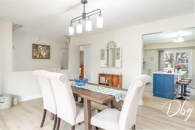 395 Magnolia Ave, Gurnee, IL 60031 - dining area featuring light wood-type flooring