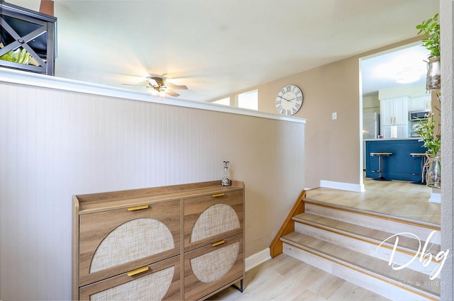 395 Magnolia Ave, Gurnee, IL 60031 - stairway featuring baseboards, a ceiling fan, and wood finished floors