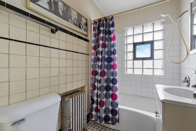 2335 N Merrimac Ave, Chicago, IL 60639 - full bath featuring tile walls, radiator, shower / bath combo with shower curtain, vanity, and toilet