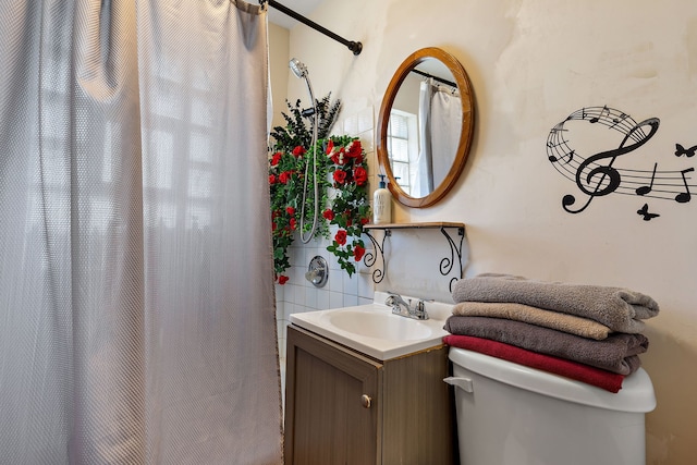2335 N Merrimac Ave, Chicago, IL 60639 - bathroom featuring vanity, toilet, and a shower with curtain