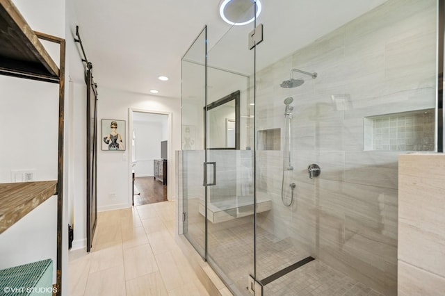 full bath with a stall shower, tile patterned floors, and recessed lighting