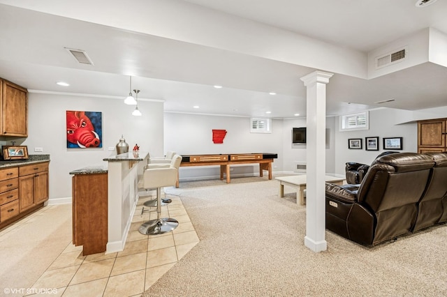 living room featuring baseboards, recessed lighting, light carpet, and visible vents