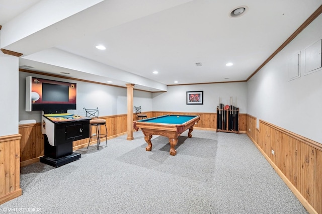 rec room with a wainscoted wall and wood walls