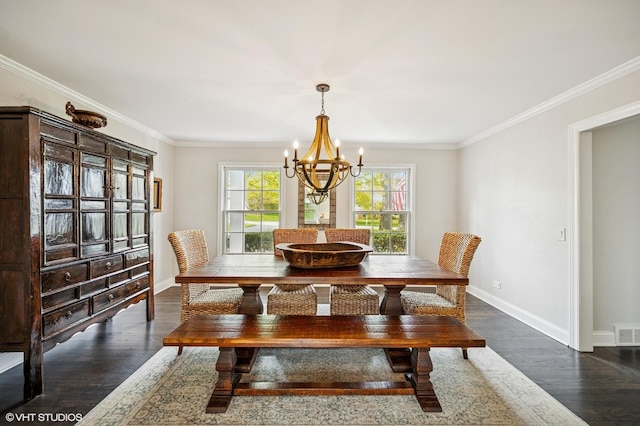 dining space with a chandelier, ornamental molding, baseboards, and dark wood-type flooring